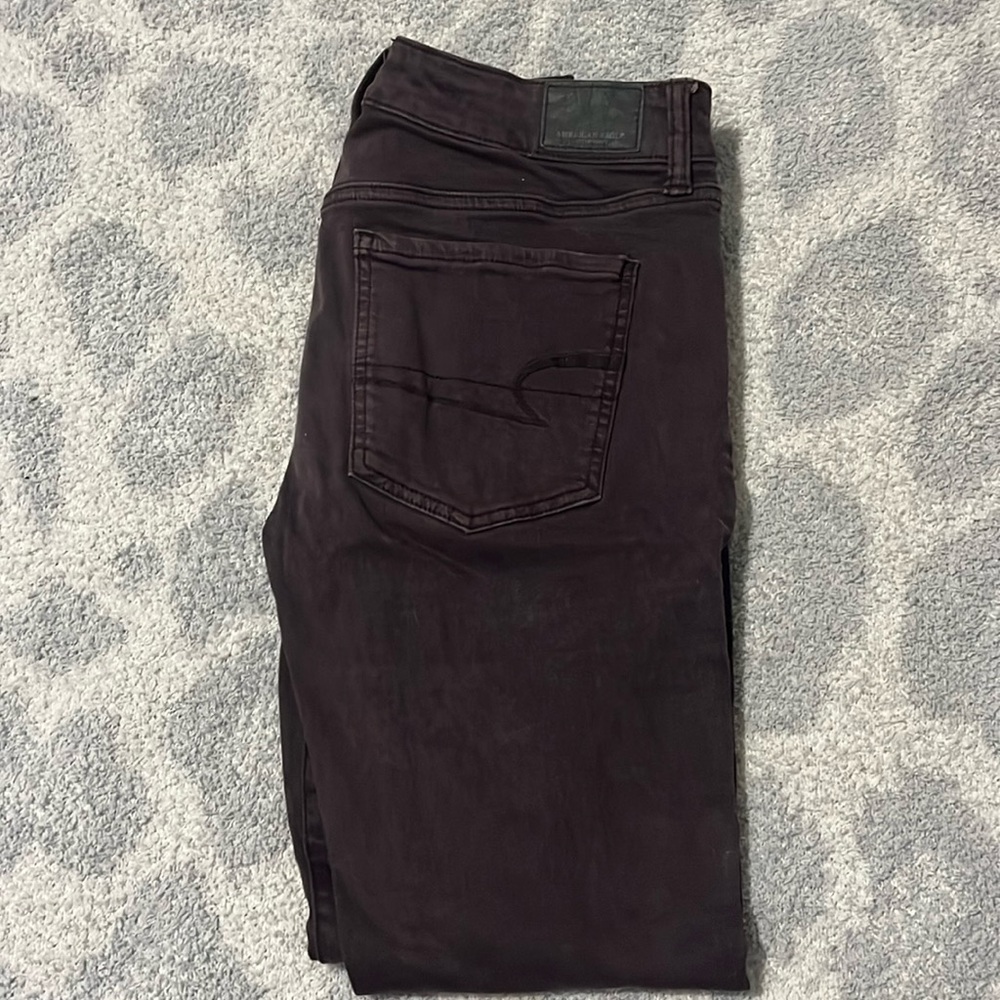 Women’s maroon American eagle skinny jeans